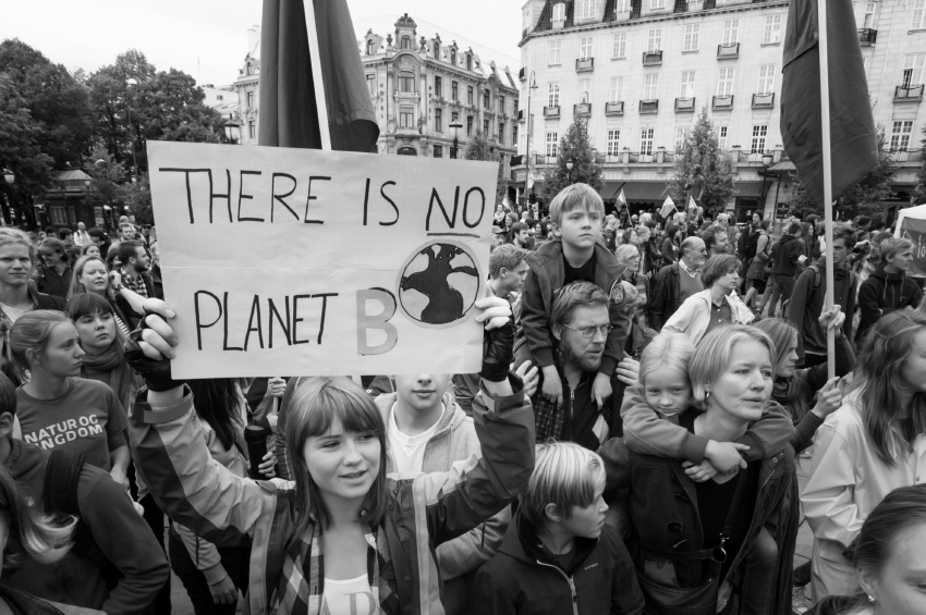 A sign reads, "There Is No Planet B", as parents carry children among thousands marching through central Oslo, Norway, to support action on global climate change, September 21, 2014. According to organizers of "The People's Climate March", the Oslo demonstration was one of 2,808 solidarity events in 166 countries, which they claim was "the largest climate march in history".