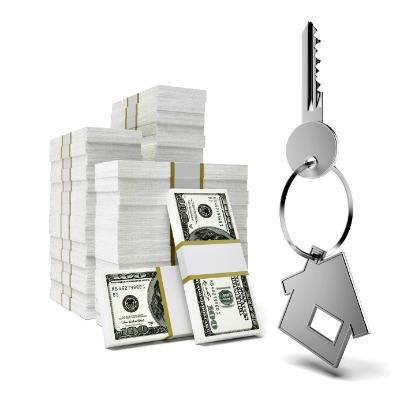 House Keys on Stack of Money isolated on a white background