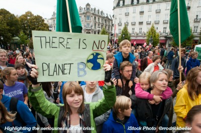 A sign reads, "There Is No Planet B", as parents carry children among thousands marching through central Oslo, Norway, to support action on global climate change, September 21, 2014. According to organizers of "The People's Climate March", the Oslo demonstration was one of 2,808 solidarity events in 166 countries, which they claim was "the largest climate march in history".