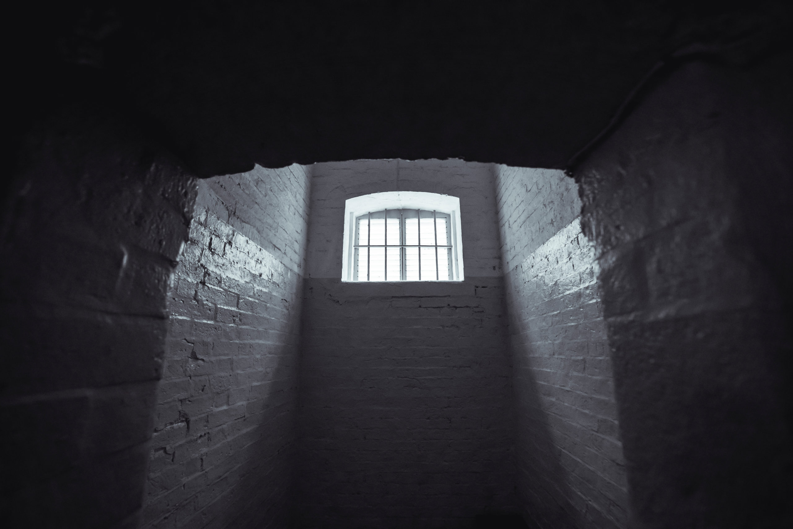 Image of light coming through prison window