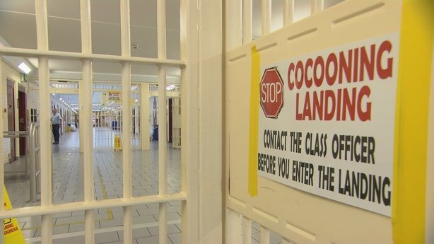 Prison landing with Covid-19 safety notices