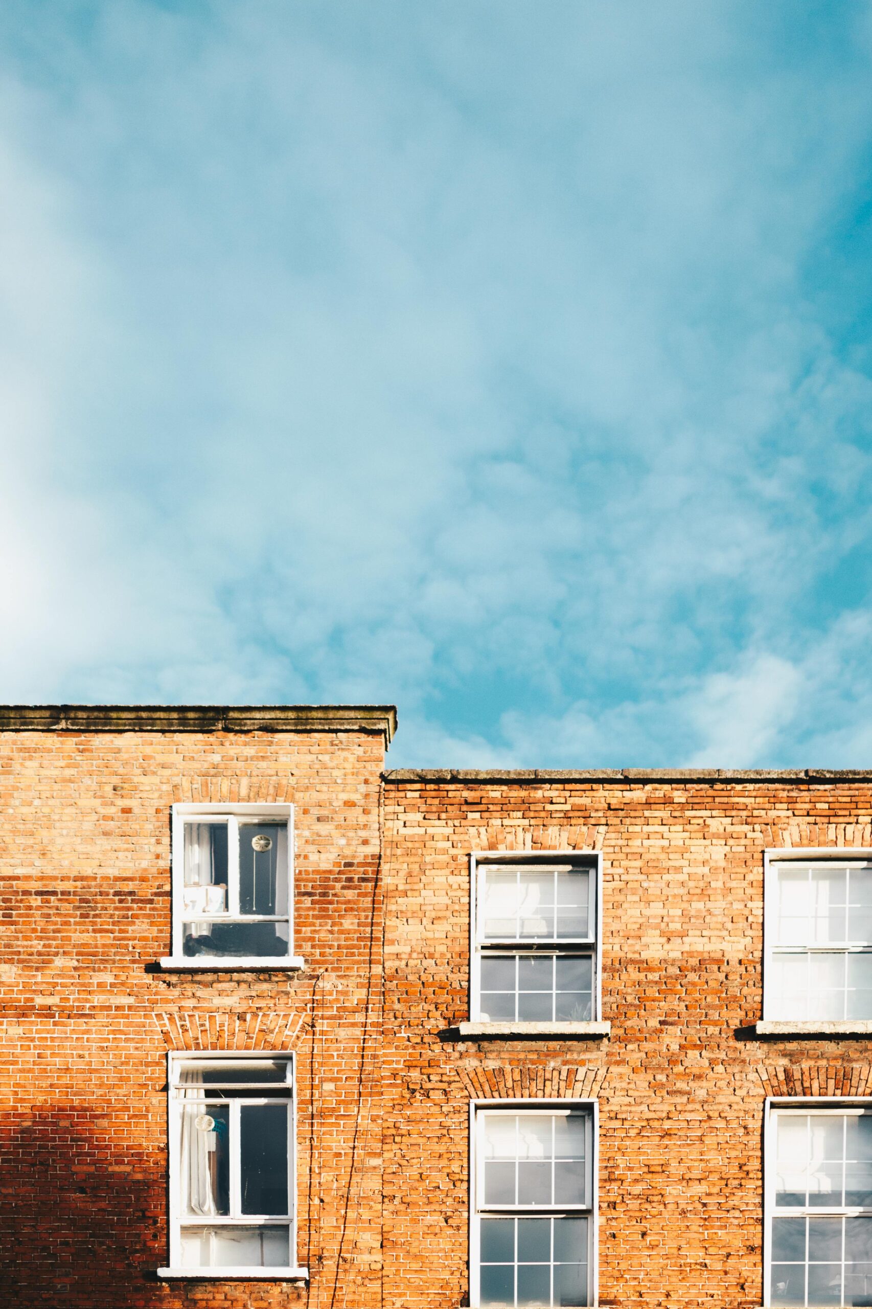 Picture of terraced housing with the sky showing