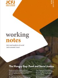 Cover of Wn 99 in orange. Tile text there and list of articles overlaid on top of a table of vegetable